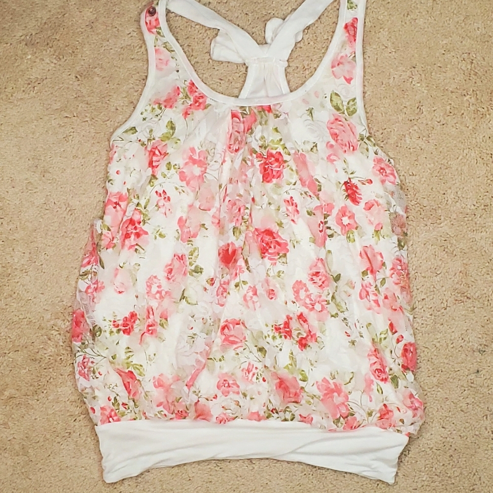 Sleeveless floral top with bow detail
